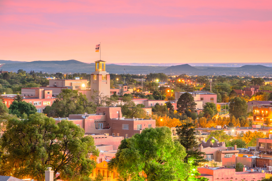 A view of the city from above at sunset.