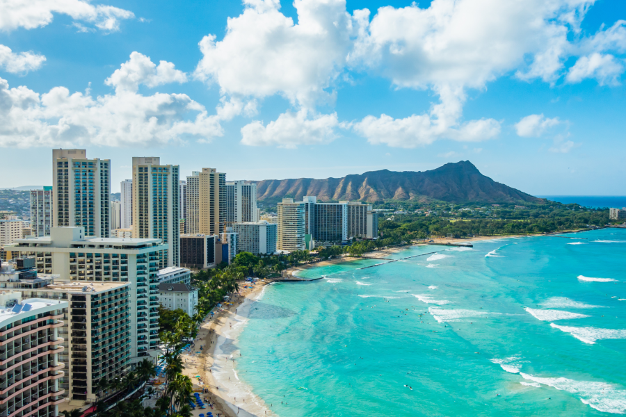 A view of the ocean and buildings in honolulu.